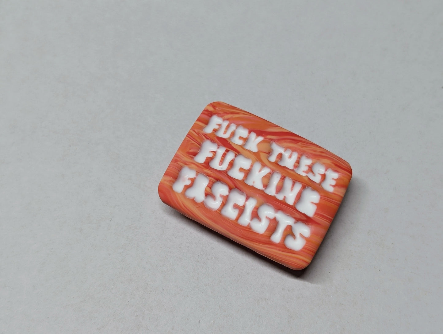 FUCKIN' FASCISTS Pin - Orange Swirls
