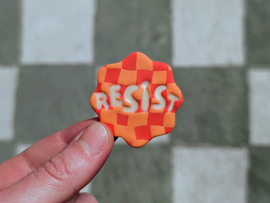 RESIST 🧲 - Orange Checks