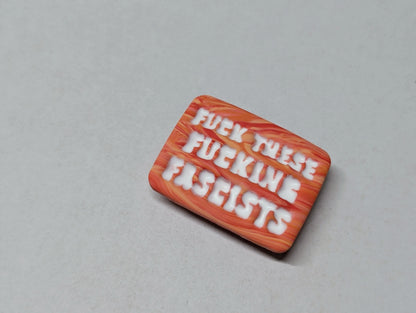 FUCKIN' FASCISTS Pin - Orange Swirls