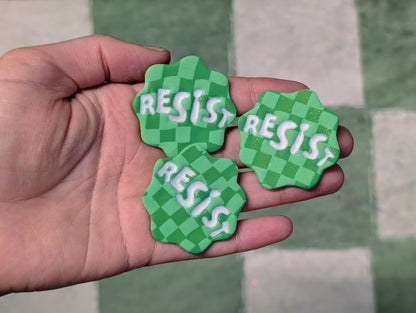 RESIST Pin - Green Checks