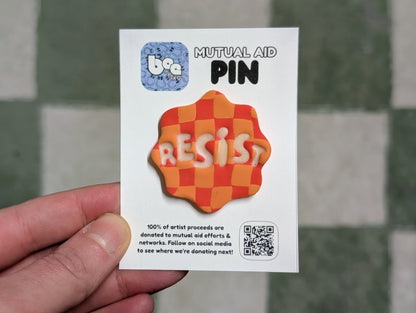 RESIST Pin - Orange Checks