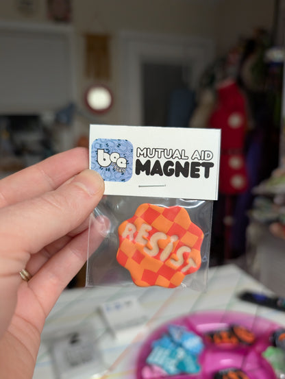 RESIST 🧲 - Orange Checks