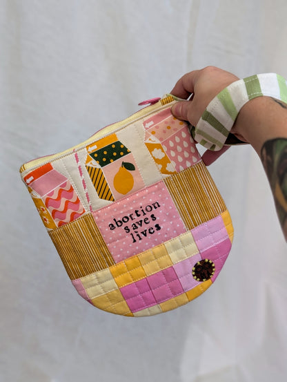 ABORTION SAVES LIVES - Quilted Wristlet