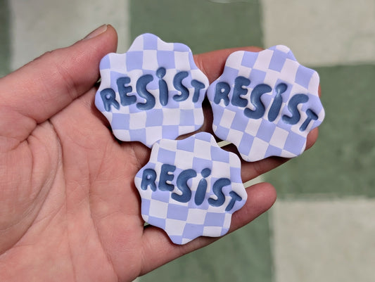 RESIST Pin - Purple Checks