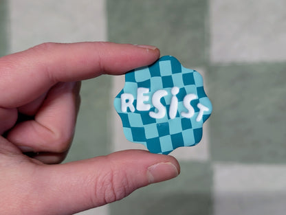 RESIST Pin - Teal Checks