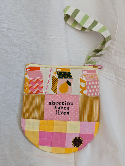 ABORTION SAVES LIVES - Quilted Wristlet