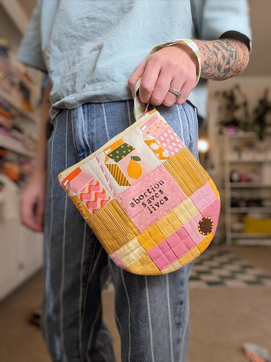 ABORTION SAVES LIVES - Quilted Wristlet