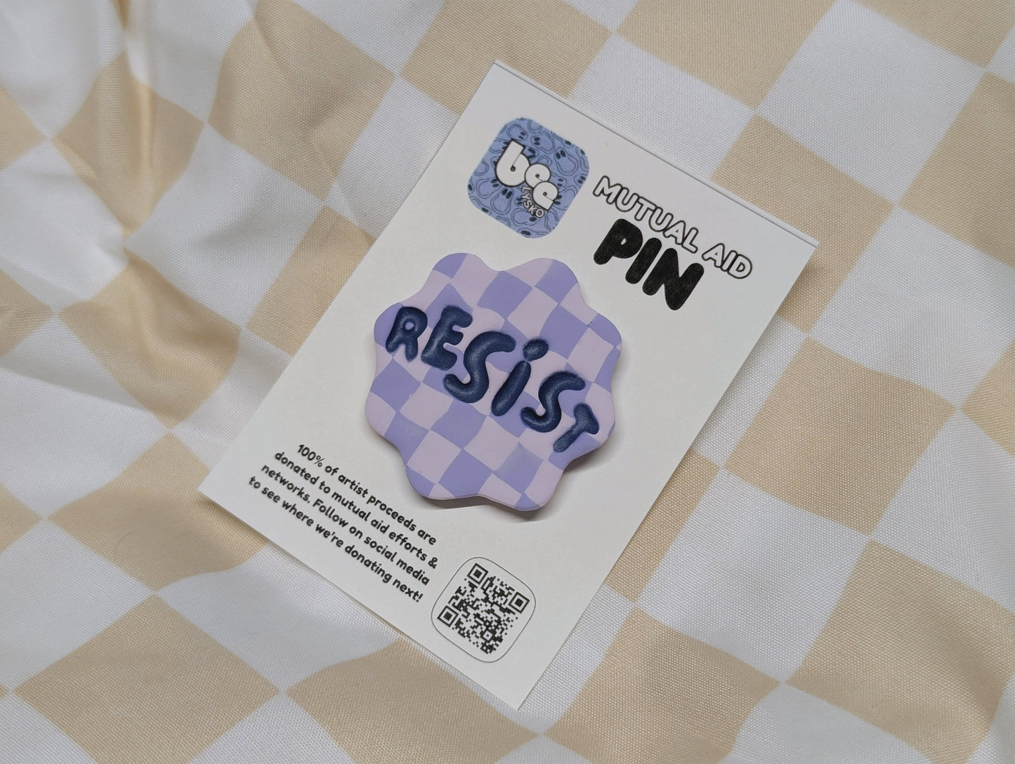 RESIST Pin - Purple Checks